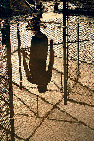Softball player going up to bat  McCarren Park, May 2008