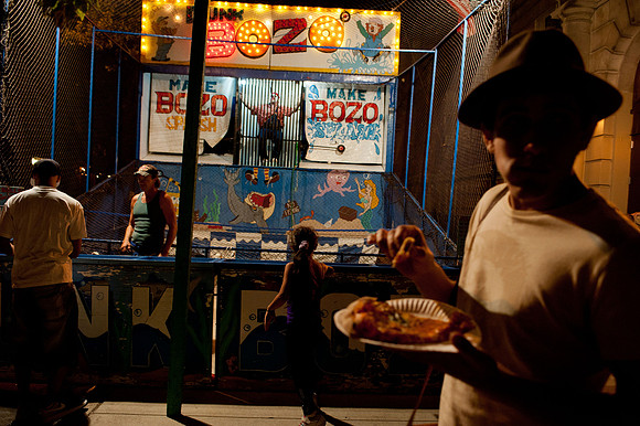 The Pizza-Eater and the Evil Taunting Clown   The Giglio Festival on Havemeyer Street, at night, July 2011.